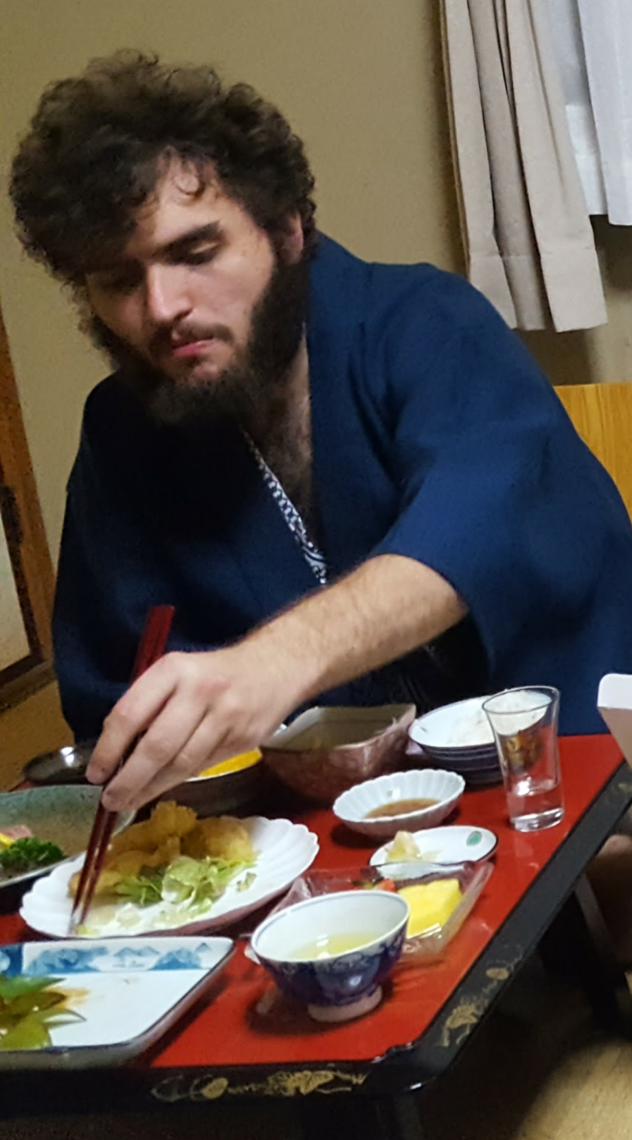Tyler Port enjoying a traditional Japanese meal